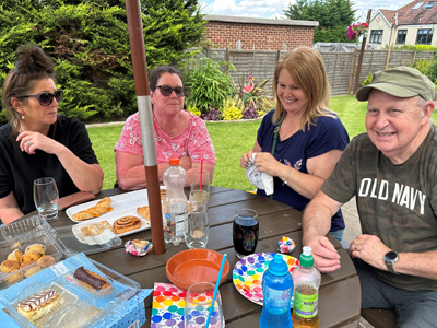 Image of 4 foster carer's sitting at a round table