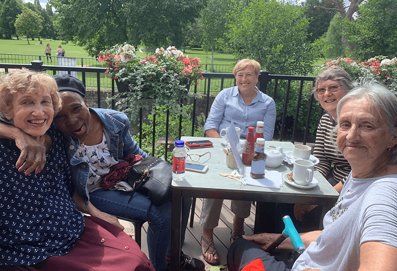 Image showing a group of women sitting down with drinks