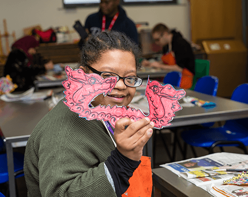 Image of a young woman creating arts and crafts