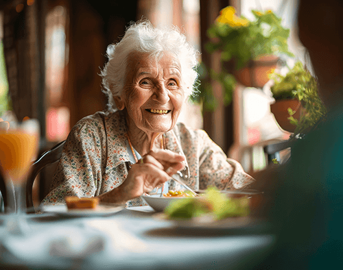 Image of an elderly woman sitting down