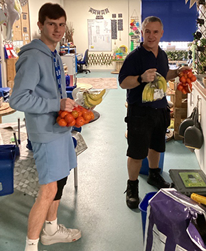 George and Mr Debenham working at Northumberland Heath Primary