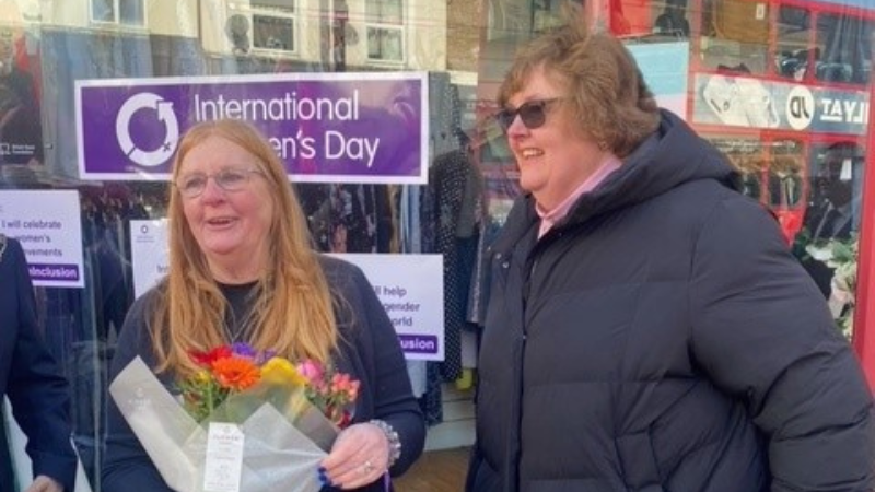 L - R Image shows Sue Petty being surprised with news of her win by the Councillor Baroness O’Neill of Bexley OBE, Leader of the Council. 