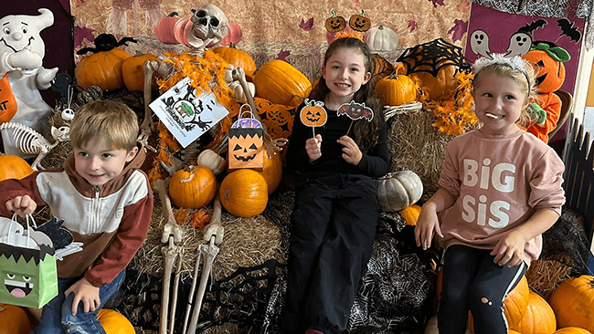 Children celebrating Halloween trail