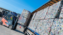 recycling bales being loaded onto a lorry